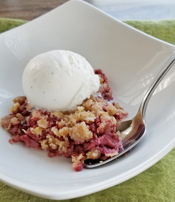 strawberry crumble al a mode with spoon