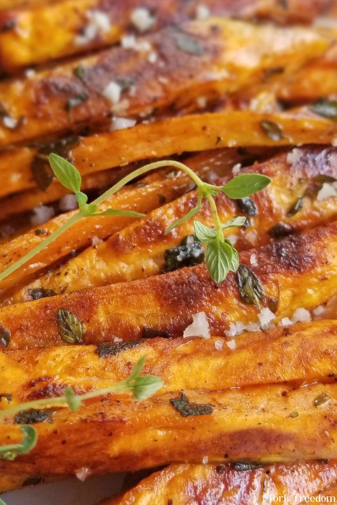 sweet potato fries with sprig of thyme