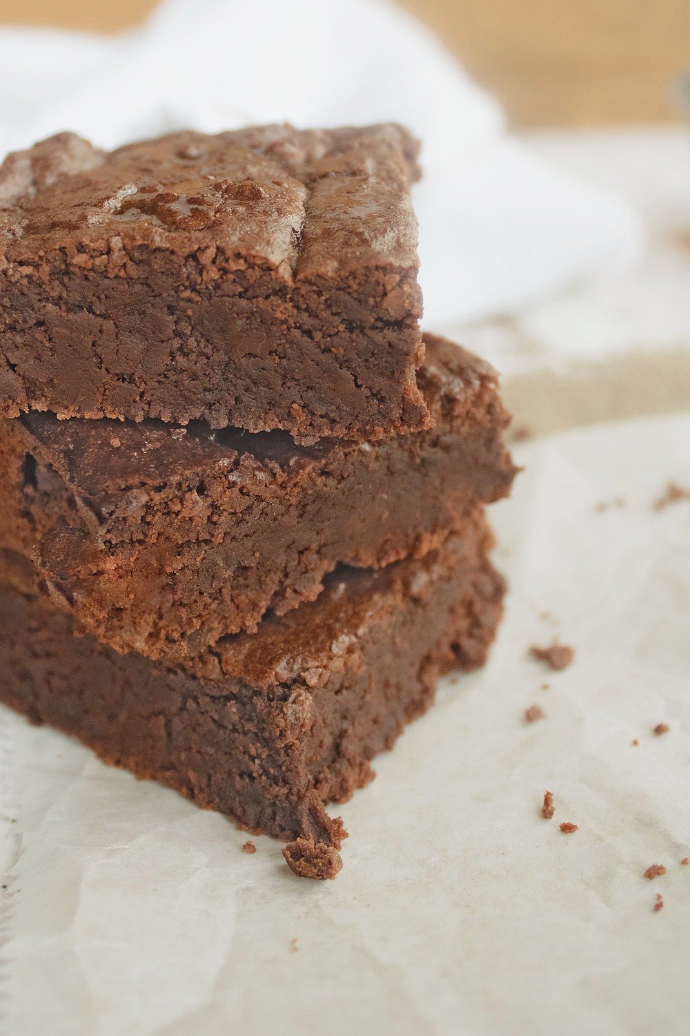 Close-up of fudgy low carb brownie showing rich chocolate texture